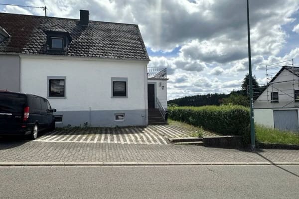 Immobilie in Hermeskeil - Solide Doppelhaushälfte mit Entwicklungspotenzial in Hermeskeil - Bild 0