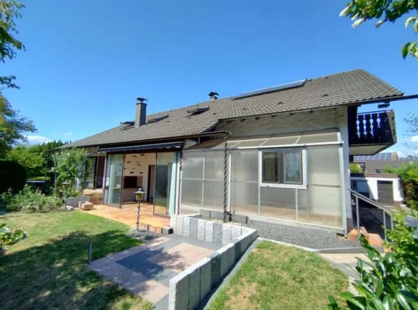 Immobilie in Renchen - Großzügiges Ein- bis Zweifamilienhaus mit Wintergarten & Traumgarten in Renchen - Bild 1