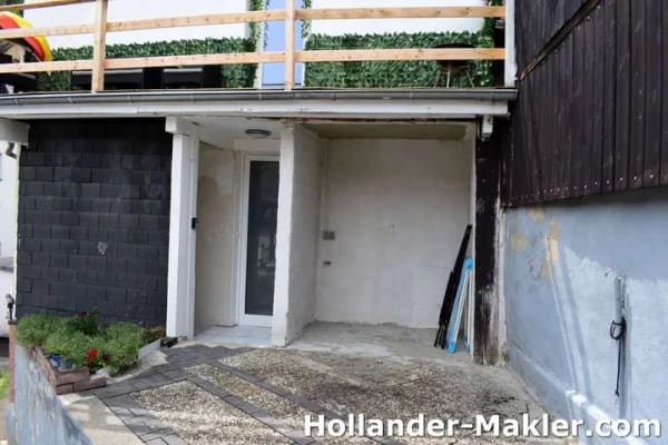 Immobilie in Briedel - Gemütliches Wohnhaus mit Garten, Moselgrundstück und herrlichem Blick auf die Weinberge - Bild 1