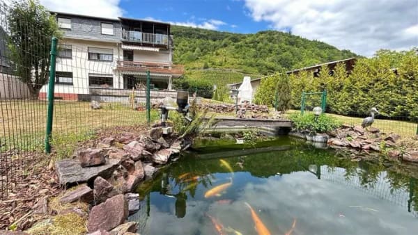 Immobilie in Alf - Wohnen wie im eigenen Haus – Gartenparadies, Sonnenterrasse & Doppelgarage in Alf - Bild 1