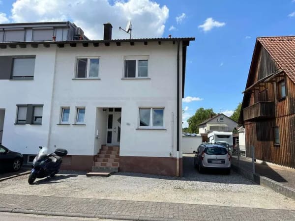 Immobilie in Leimersheim - Solide Doppelhaushälfte mit vier Zimmern, Garten und Garage - Bild 0