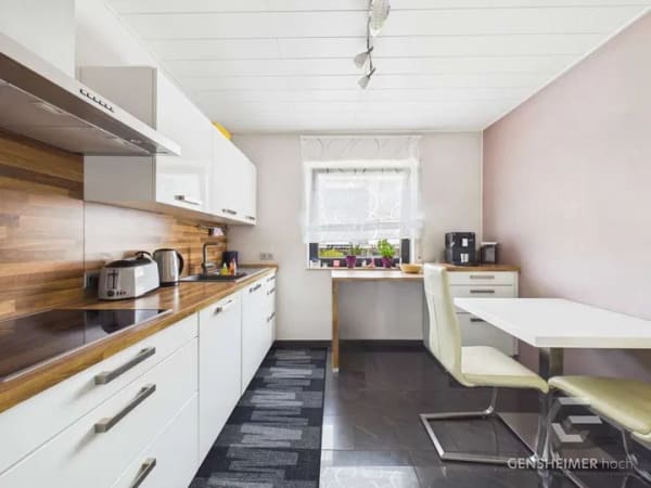 Immobilie in Jockgrim - Modernisierte 4-Zimmer-Wohnung mit Balkon, Garage und Gartenblick - Bild 4