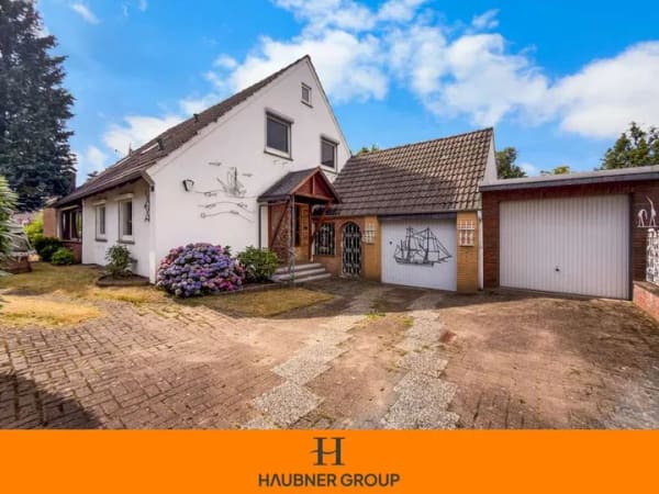Immobilie in Ritterhude - 1-2-Familienhaus mit 2 Garagen und Wintergarten in Ritterhude-Ihlpohl - Bild 0