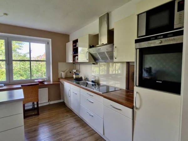Immobilie in Grube - Exklusives Einfamilienhaus mit Gartenparadies, Teich und Ferienwohnung in begehrter Feldrandlage - Bild 3