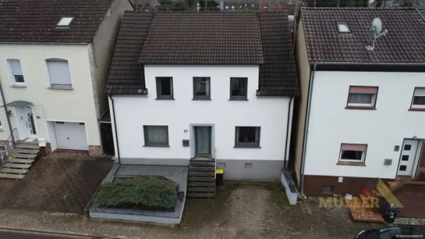 Immobilie in Ensdorf/Saar - Schickes Einfamilienhaus mit 6 ZKB und Garten zu verkaufen - Bild 0
