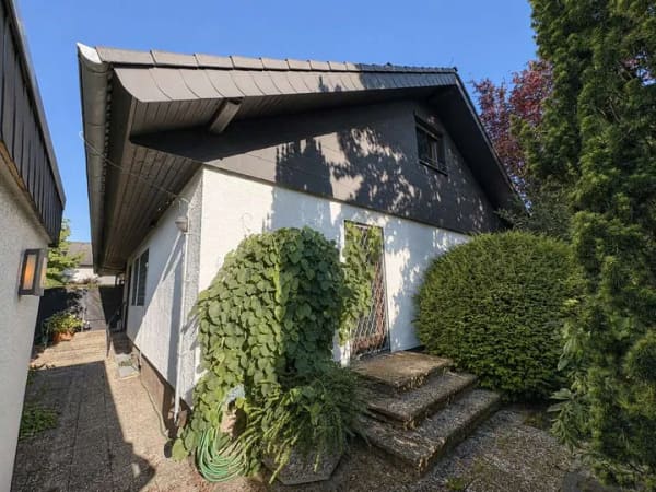 Immobilie in Münster (Hessen) - Großes Einfamilienhaus mit Einliegerwohnung und traumhaftem Garten! - Bild 1