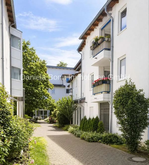 Immobilie in Pulheim - KAPITALANLAGE 
Seniorengerechte DG-Wohnung mit Aufzug und Balkon in Pulheim-Stommeln (Christinapark - Bild 1