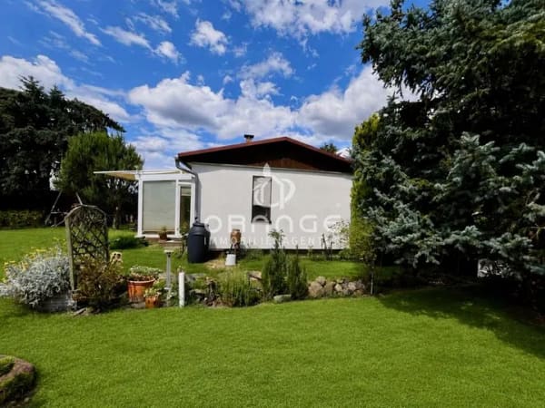Immobilie in Mockrehna - *** Wohnen im Grünen – Gepflegter Bungalow mit Wintergarten in idyllischer Naturlage *** - Bild 1