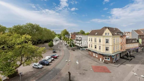 Immobilie in Oberhausen - Großzügige Dachgeschosswohnung mit zwei Balkonen und Aufzug - Bild 1