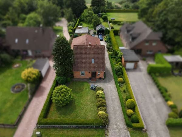 Immobilie in Wardenburg - Einfamilienhaus mit großem Grundstück und viel Potenzial in Achternmeer - Bild 1