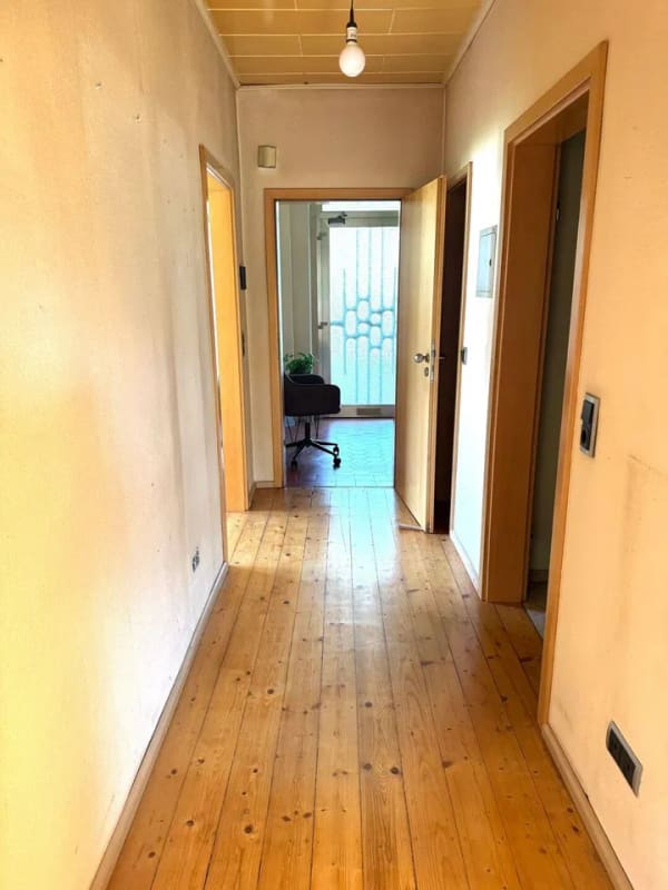 Immobilie in Holzwickede - Mehrfamilienhaus mit 3 Wohneinheiten, Vollkeller und möglichen An- und Umbauvarianten. - Bild 1