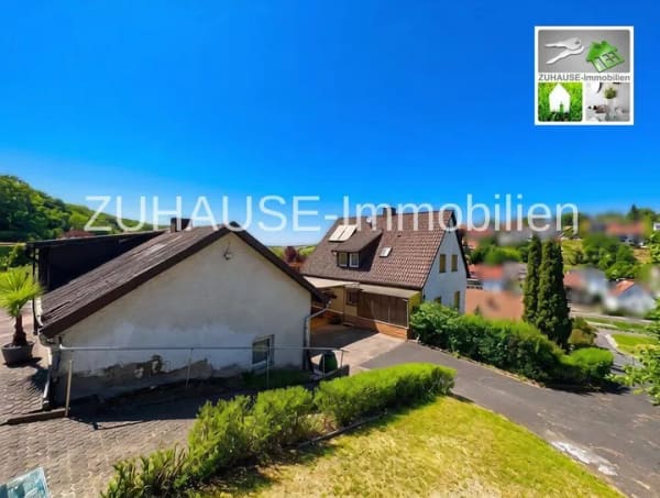 Immobilie in Theilheim - Idyllisches Wohnen mit Weitblick: Ihr vielseitiges Raumwunder im Weinort Theilheim - Bild 2