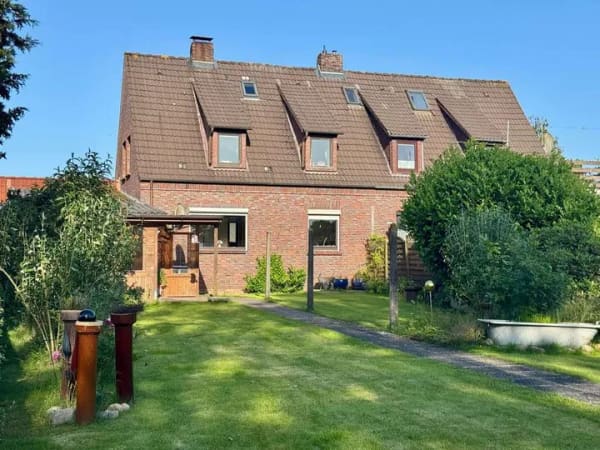 Immobilie in Jever - Attraktive Doppelhaushälfte in Sackgassenlage mit Feldblick in Jever - Bild 1