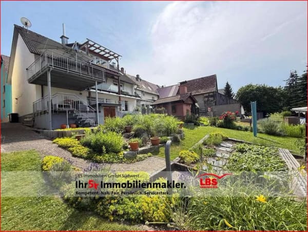 Immobilie in Gottmadingen - Ein Zuhause für Gartenliebhaber – zwei Wohnungen und viel Freiraum im Grünen - Bild 0