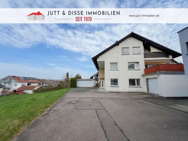 Immobilie in Kuppenheim - Bezugsfreies 3-Familienhaus mit sonnigem Gartengrundstück und 3 Garagen in Kuppenheim - Bild 0