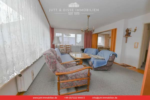 Immobilie in Kuppenheim - Bezugsfreies 3-Familienhaus mit sonnigem Gartengrundstück und 3 Garagen in Kuppenheim - Bild 1