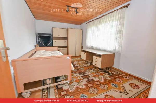 Immobilie in Kuppenheim - Bezugsfreies 3-Familienhaus mit sonnigem Gartengrundstück und 3 Garagen in Kuppenheim - Bild 3
