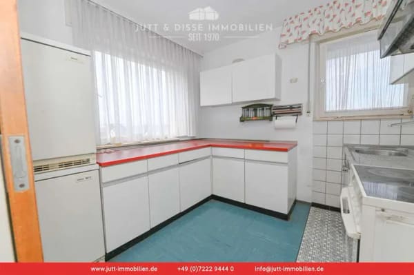 Immobilie in Kuppenheim - Bezugsfreies 3-Familienhaus mit sonnigem Gartengrundstück und 3 Garagen in Kuppenheim - Bild 4