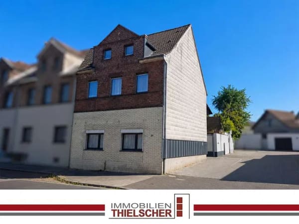 Immobilie in Übach-Palenberg - Mehrfamilienhaus mit drei vermieteten Wohneinheiten und Gartenanteil in Übach-Palenberg - Bild 0