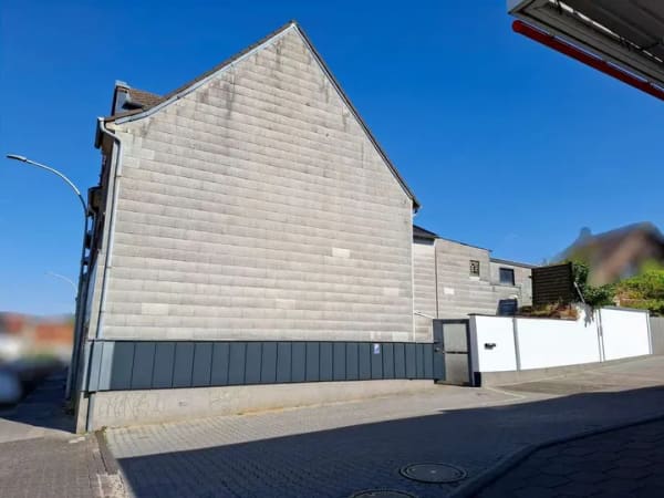 Immobilie in Übach-Palenberg - Mehrfamilienhaus mit drei vermieteten Wohneinheiten und Gartenanteil in Übach-Palenberg - Bild 2