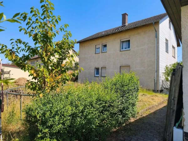 Immobilie in Külsheim - Charmantes Zweifamilienhaus mit großem Grundstück und viel Potenzial in Külsheim - Bild 1