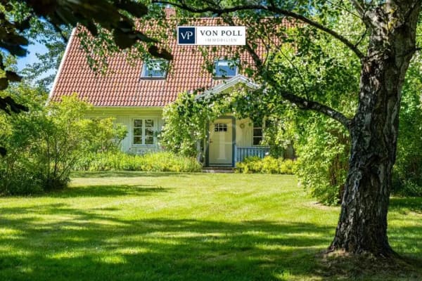 Immobilie in Zingst - Skandinavienflair I Einladendes Einfamilienhaus mit Kamin, Wintergarten und großem Gartenidyll - Bild 0