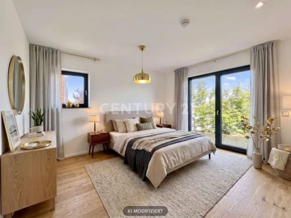 Immobilie in Bad Kötzting - Erstbezug! Moderne 3-Zimmer-Wohnung mit Terrasse und Gartenanteil - Bild 1