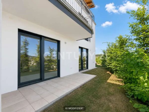 Immobilie in Bad Kötzting - Erstbezug! Moderne 3-Zimmer-Wohnung mit Terrasse und Gartenanteil - Bild 2