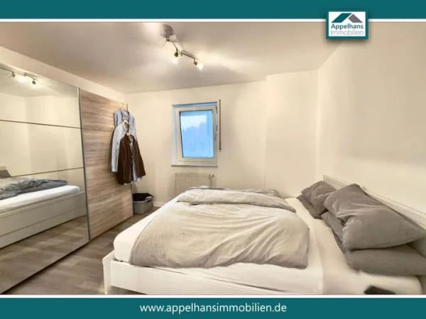 Immobilie in Bielefeld - Freigestellte Eigentumswohnung mit Balkon und Tiefgarage in Bielefeld! - Bild 2