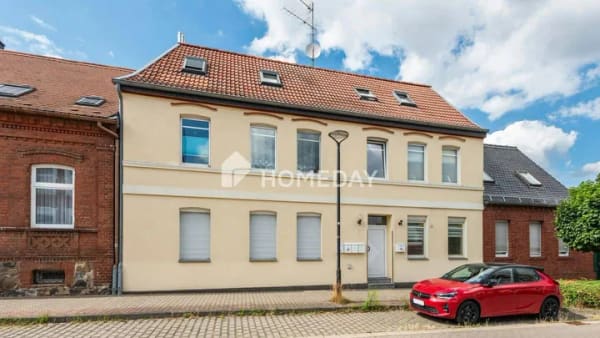 Immobilie in Burg - Solide Kapitalanlage - Attraktives Mehrfamilienhaus mit 5 Wohneinheiten und Gemeinschaftsgarten - Bild 1