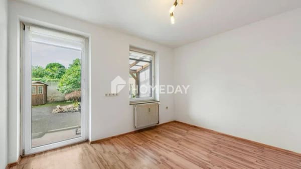 Immobilie in Burg - Solide Kapitalanlage - Attraktives Mehrfamilienhaus mit 5 Wohneinheiten und Gemeinschaftsgarten - Bild 3