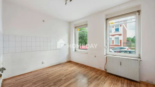 Immobilie in Burg - Solide Kapitalanlage - Attraktives Mehrfamilienhaus mit 5 Wohneinheiten und Gemeinschaftsgarten - Bild 4