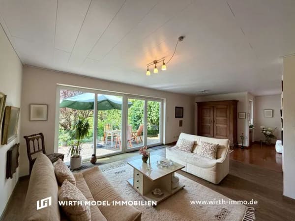 Immobilie in Üchtelhausen - Großzügiges Einfamilienhaus mit Garage, Garten und Fernblick in Üchtelhausen-Zell - Bild 0