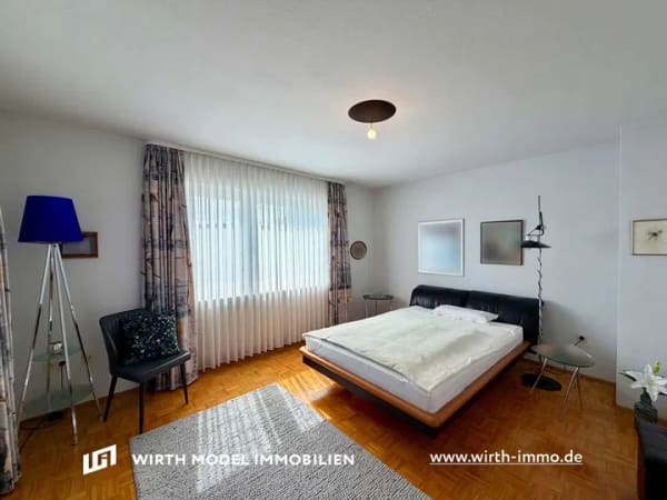 Immobilie in Üchtelhausen - Großzügiges Einfamilienhaus mit Garage, Garten und Fernblick in Üchtelhausen-Zell - Bild 3