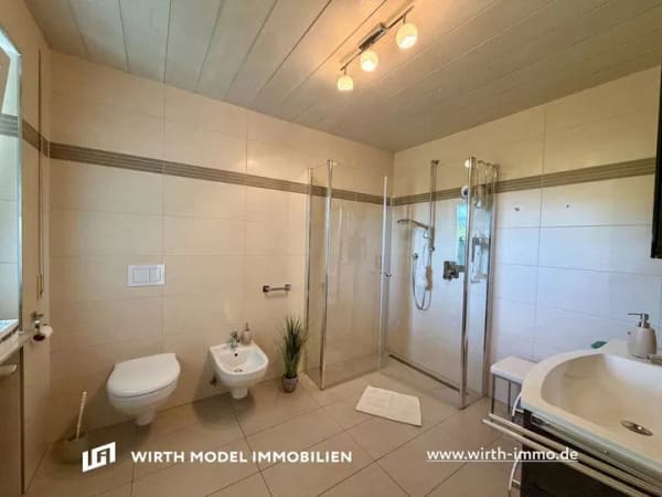 Immobilie in Üchtelhausen - Großzügiges Einfamilienhaus mit Garage, Garten und Fernblick in Üchtelhausen-Zell - Bild 4