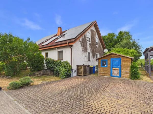 Immobilie in Wölfersheim - Wohnen, Vermieten oder Mehrgenerationenleben: Haus mit Einliegerwohnung & Feldblick - Bild 2