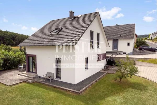 Immobilie in Gerach - Modernes Einfamilienwohnhaus mit Doppelcarport in ruhiger Randlage von Gerach - Bild 1