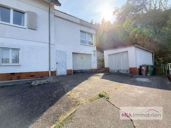 Immobilie in Künzelsau - Rarität in Künzelsau: Dreifamilienhaus mit 1.163 m² Grundstück in traumhafter Waldrandlage - Bild 2