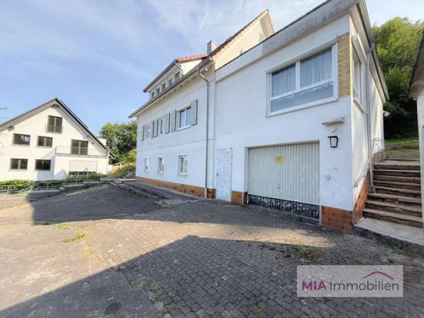 Immobilie in Künzelsau - Rarität in Künzelsau: Dreifamilienhaus mit 1.163 m² Grundstück in traumhafter Waldrandlage - Bild 4