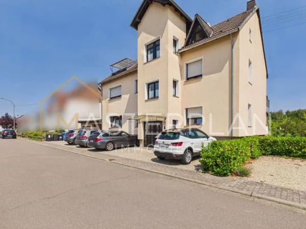 Immobilie in Überherrn - Unterfelsberg: Freistehendes Dreifamilienhaus mit 2 Garagen - Bild 1