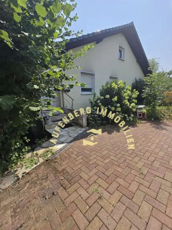 Immobilie in Eitorf - Einfamilienhaus in Eitorf mit flexiblem Wohnbereich – ideal für Familien/Mehrgenerationen - Bild 1