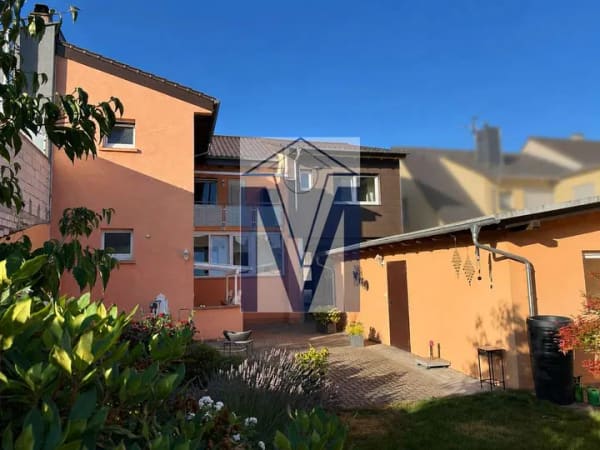 Immobilie in Neulußheim - Vielseitiges Zweifamilienhaus mit Innenhof, Garage, PV-Anlage und neuem Dach - Bild 1