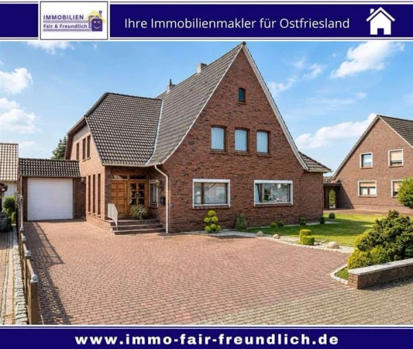 Immobilie in Rhauderfehn - Einfamilienhaus mit separater ELW, Kamin, Sauna und traumhaftem Garten in Westrhauderfehn - Bild 0