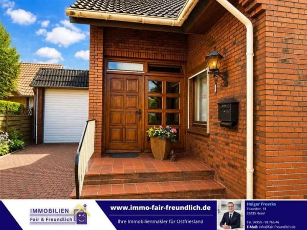 Immobilie in Rhauderfehn - Einfamilienhaus mit separater ELW, Kamin, Sauna und traumhaftem Garten in Westrhauderfehn - Bild 1