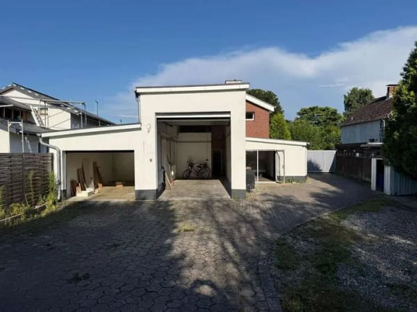 Immobilie in Heidgraben - Zweifamilienhaus mit 3 Garagen - Bild 2