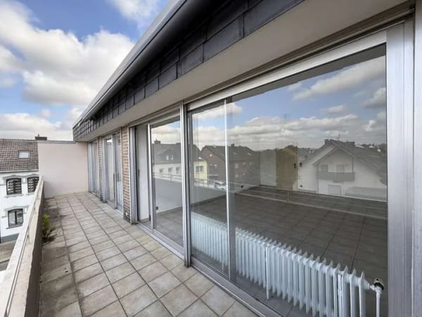 Immobilie in Düren - Großzügige 4-Zimmer-Eigentumswohnung mit drei Loggien und Garage in Düren-Gürzenich - Bild 4