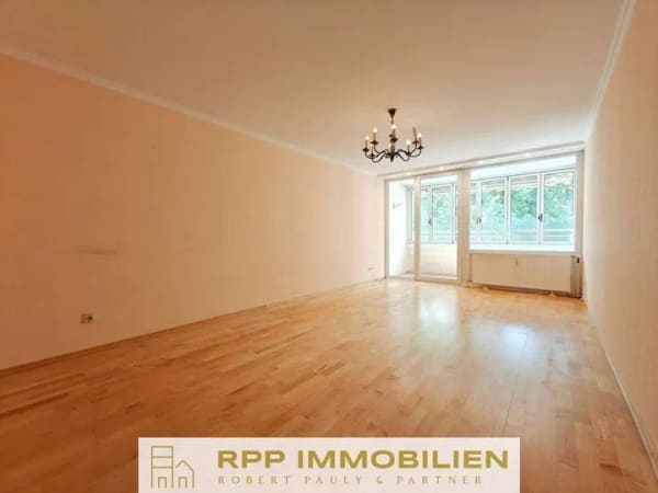 Immobilie in Oberschleißheim - Ideal für Paare und kleine Familien: 3-Zimmer-Wohnung mit viel Potenzial und sonniger Süd-Loggia - Bild 1