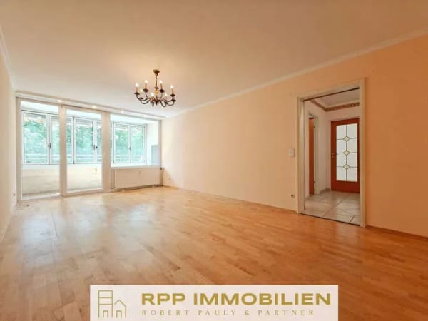 Immobilie in Oberschleißheim - Ideal für Paare und kleine Familien: 3-Zimmer-Wohnung mit viel Potenzial und sonniger Süd-Loggia - Bild 2