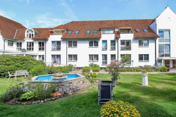 Immobilie in Malente - Helle und gepflegte Dachgeschosswohnung in der Residenz Magnushof in Malente - Bild 1