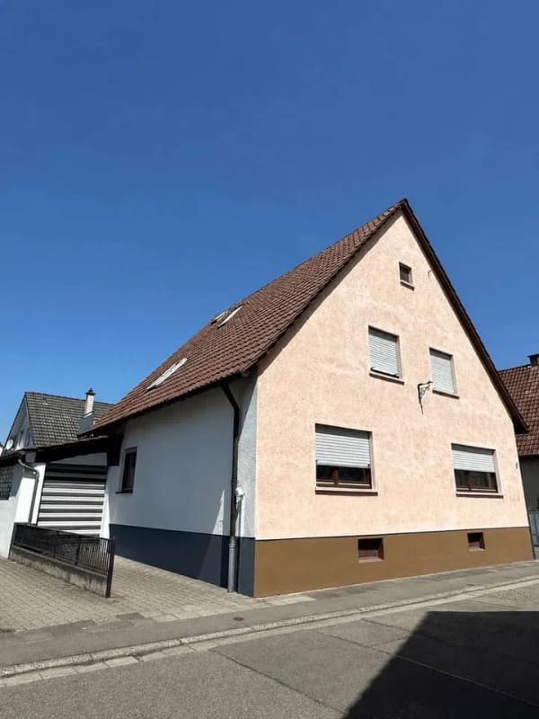 Immobilie in Jockgrim - Flexibles Wohnkonzept: Zweifamilienhaus mit vermieteter Einheit und viel Potenzial - Bild 1